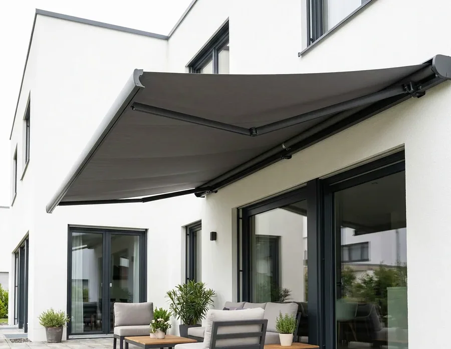 Folding-arm awning extended on its jointed arms over a patio at a Kyalami home